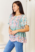 Load image into Gallery viewer, Floral Tie Neck Short Sleeve Blouse
