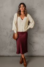 Load image into Gallery viewer, Spanish woman in cream cardigan with burgundy midi dress
