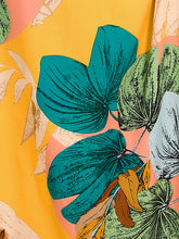 Load image into Gallery viewer, Slit Tied Printed Surplice Dress