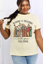 Load image into Gallery viewer, READING IS DREAMING WITH YOUR EYES OPEN Graphic Tee