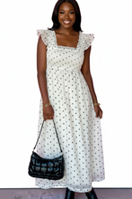 Load image into Gallery viewer, Black model in polka dot dress on white background
