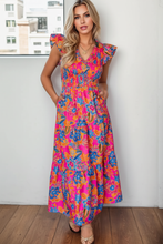 Load image into Gallery viewer, Model in tropical floral maxi dress
