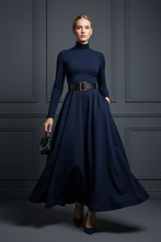 Load image into Gallery viewer, White model in navy maxi dress
