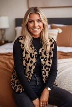 Load image into Gallery viewer, Woman in leopard print vest with face visible

