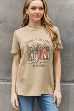 Load image into Gallery viewer, READING IS DREAMING WITH YOUR EYES OPEN Graphic Tee
